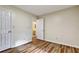 Bedroom with wood-look floors and access to an ensuite bathroom at 6211 Ward Rd, Union City, GA 30291