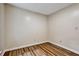 Bedroom with wood-look floors, neutral paint and baseboards at 6211 Ward Rd, Union City, GA 30291