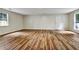 Spacious and bright living room with laminate floors and ample natural light at 6211 Ward Rd, Union City, GA 30291