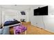 Bedroom featuring a bunk bed with an additional twin bed, and television on wall at 2323 Wingfoot Pl, Decatur, GA 30035