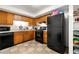 Functional kitchen with matching appliances, ample counter space, and wooden cabinetry at 2323 Wingfoot Pl, Decatur, GA 30035