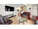 Bright living area with hardwood floors, stairs, shelves, and an open floor plan at 2323 Wingfoot Pl, Decatur, GA 30035