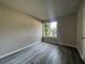 A bedroom with hardwood floors and neutral paint at 33 Drew Ct, Jonesboro, GA 30238