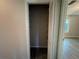 An open closet with adjustable shelving provides efficient storage solutions, maximizing space utilization at 33 Drew Ct, Jonesboro, GA 30238