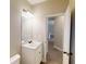 Bathroom featuring a vanity with a single sink, a modern faucet, and a large mirror at 504 Iris Way, Villa Rica, GA 30180
