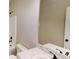 Bathroom featuring a marble countertop, modern fixtures, and a well-lit mirror, providing a stylish and functional space at 504 Iris Way, Villa Rica, GA 30180