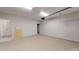 Well-lit garage with an automatic door opener and space for storage, offering functionality and convenience at 504 Iris Way, Villa Rica, GA 30180