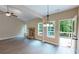 Bright living room showcases a stone fireplace and access to outdoor deck at 504 Iris Way, Villa Rica, GA 30180