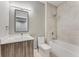 Modern bathroom featuring tile walls, shower over tub and wood vanity with marble countertop at 1099 North Ne Ave # 11, Atlanta, GA 30307