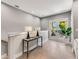 Hallway featuring hardwood floors, natural light, and doors leading to an outdoor deck at 1099 North Ne Ave # 11, Atlanta, GA 30307