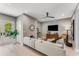 Bright living room with a large sofa, ceiling fan, and french doors to the outside at 1099 North Ne Ave # 11, Atlanta, GA 30307