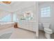 Neutral-toned bathroom with tub, shower, and lots of vanity storage at 1416 Vernon Ridge Close, Dunwoody, GA 30338
