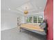 Expansive bedroom with windows, a tray ceiling, and neutral carpet at 1416 Vernon Ridge Close, Dunwoody, GA 30338