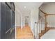 Inviting foyer with hardwood floors, staircase, and neutral walls provides a warm welcome at 1416 Vernon Ridge Close, Dunwoody, GA 30338