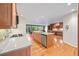 Kitchen with custom wood cabinets, granite countertops, and stainless steel appliances at 1416 Vernon Ridge Close, Dunwoody, GA 30338