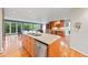 Open concept kitchen with custom wood cabinets, granite countertops and stainless appliances at 1416 Vernon Ridge Close, Dunwoody, GA 30338