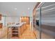 Open concept kitchen with custom wood cabinets, granite countertops, and stainless steel appliances at 1416 Vernon Ridge Close, Dunwoody, GA 30338