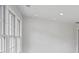 Empty living room with neutral paint, many windows, and great natural light at 1416 Vernon Ridge Close, Dunwoody, GA 30338