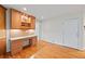 Charming home office with built-in cabinets, granite countertops, and pristine hardwood floors at 1416 Vernon Ridge Close, Dunwoody, GA 30338