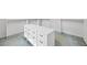 Walk-in closet with white dresser and ample storage space at 1416 Vernon Ridge Close, Dunwoody, GA 30338