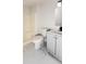 Well-lit bathroom featuring a vanity with modern fixtures and a shower-tub combo at 2027 Lois Pl, Atlanta, GA 30318