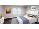 Bright bedroom with a plush bed, stylish accents, and a large window, creating a peaceful ambiance at 2027 Lois Pl, Atlanta, GA 30318