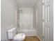 Bathroom features a shower and bath combo with tile floors at 110 Silverthorne Dr, Douglasville, GA 30134