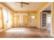 Bright living room features a doorway and natural light from the windows at 969 Byron Sw Dr, Atlanta, GA 30310
