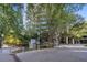 Exterior view of building with lush landscaping, modern architecture, and street access at 3338 Peachtree Ne Rd # 3406, Atlanta, GA 30326
