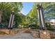 Tranquil outdoor space features seating, walkways, landscaping and decorative elements at this condo property at 3338 Peachtree Ne Rd # 3406, Atlanta, GA 30326