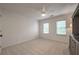 Neutral bedroom with carpeted floors, ceiling fan and plenty of natural light at 10650 Centennial Dr, Alpharetta, GA 30022