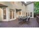 Spacious outdoor patio with a dining table set, perfect for entertaining or enjoying al fresco meals at 10650 Centennial Dr, Alpharetta, GA 30022