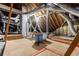 Spacious attic with exposed wooden beams and ductwork, offering potential for storage at 2525 Fairview Dr, Cumming, GA 30041
