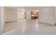 Wide shot of basement area showing tile flooring and kitchenette at 2525 Fairview Dr, Cumming, GA 30041