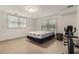 Bedroom features 2 large windows, room for an exercise space and neutral colors at 2525 Fairview Dr, Cumming, GA 30041
