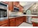 Close up of modern kitchen with stainless steel appliances and countertops at 2525 Fairview Dr, Cumming, GA 30041