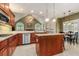 Well-equipped kitchen with granite countertops, stainless steel appliances, and island at 2525 Fairview Dr, Cumming, GA 30041