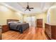 Serene main bedroom with a tray ceiling and hardwood floors at 2525 Fairview Dr, Cumming, GA 30041