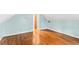 Finished attic featuring hardwood floors and light blue walls at 6719 Sunset Valley Cir, Rex, GA 30273