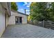 Spacious wooden deck with gray railings, providing an ideal outdoor living space for relaxation and entertainment at 6719 Sunset Valley Cir, Rex, GA 30273
