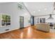 Bright and airy living room featuring hardwood floors and ample natural light at 6719 Sunset Valley Cir, Rex, GA 30273