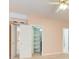 Bedroom featuring two doorways and a walk in closet with built in shelving at 1350 Whitley Rd, Dacula, GA 30019