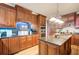 Gourmet kitchen with wood cabinets, stainless steel appliances, granite countertops, and a center island at 1350 Whitley Rd, Dacula, GA 30019