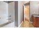 Bathroom with a tub and shower combination and vanity with a wood finish at 2284 Nicole Dr, Hampton, GA 30228