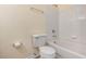 Standard bathroom featuring a shower-tub combo with tiled walls and essential fixtures at 2284 Nicole Dr, Hampton, GA 30228