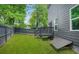 Fenced yard offers a private outdoor space with a raised deck at 935 Pelham Nw St, Atlanta, GA 30318