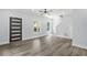 Living room features hardwood floors, a modern front door and staircase at 935 Pelham Nw St, Atlanta, GA 30318