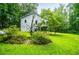 Charming home on a spacious lot with lush landscaping and mature trees at 1775 Whooping Creek Rd, Carrollton, GA 30116