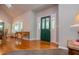 Bright foyer features hardwood floors and a decorative front door at 1775 Whooping Creek Rd, Carrollton, GA 30116