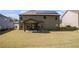 Expansive backyard with a covered patio, ideal for outdoor activities at 6918 Diamond Dr, Rex, GA 30273